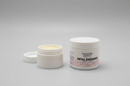 Two containers of Madame Sophy Petal Radiance Body Balm on a marble surface.